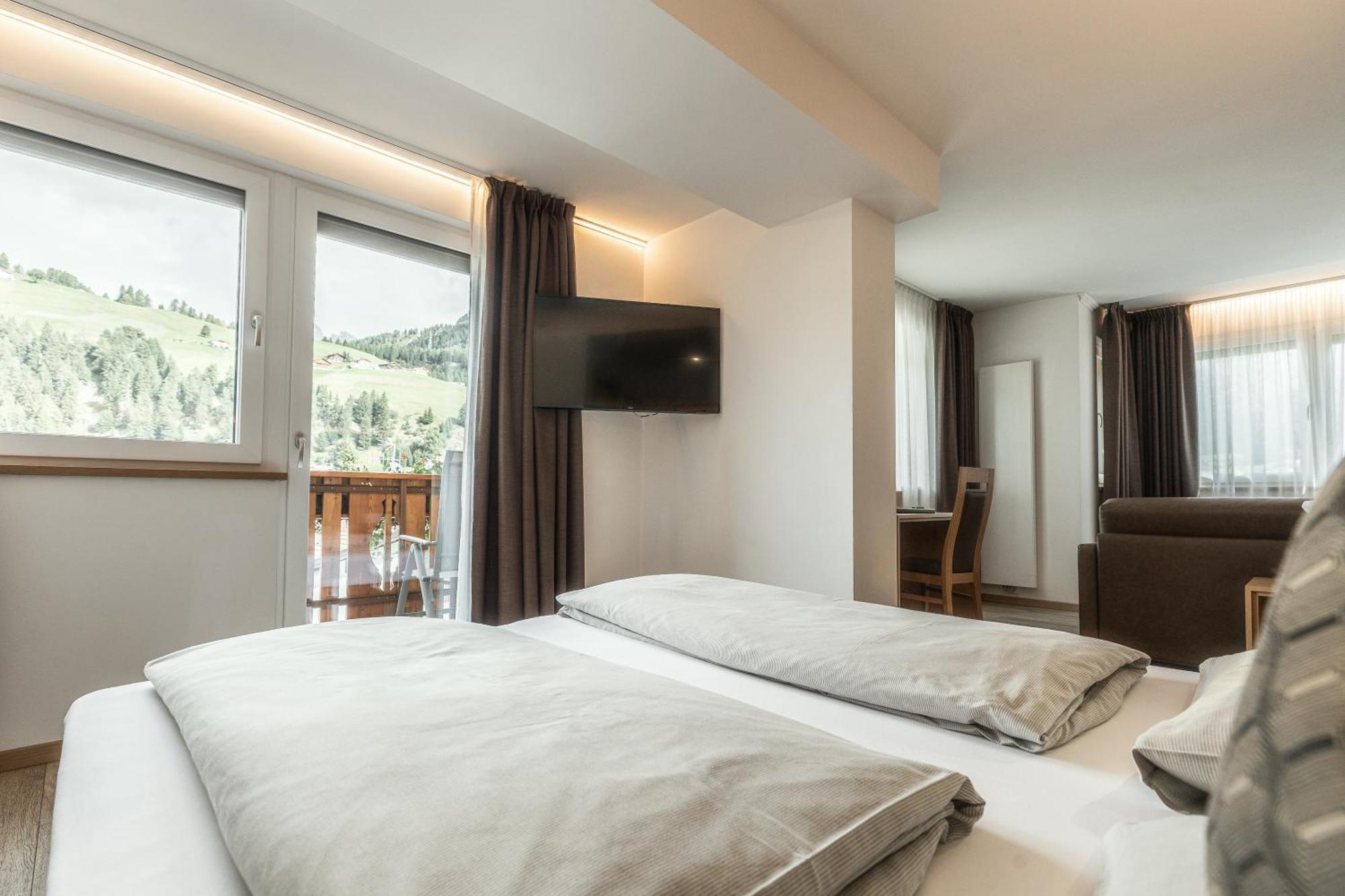 Hotel La Pineta Selva di Val Gardena Szoba fotó