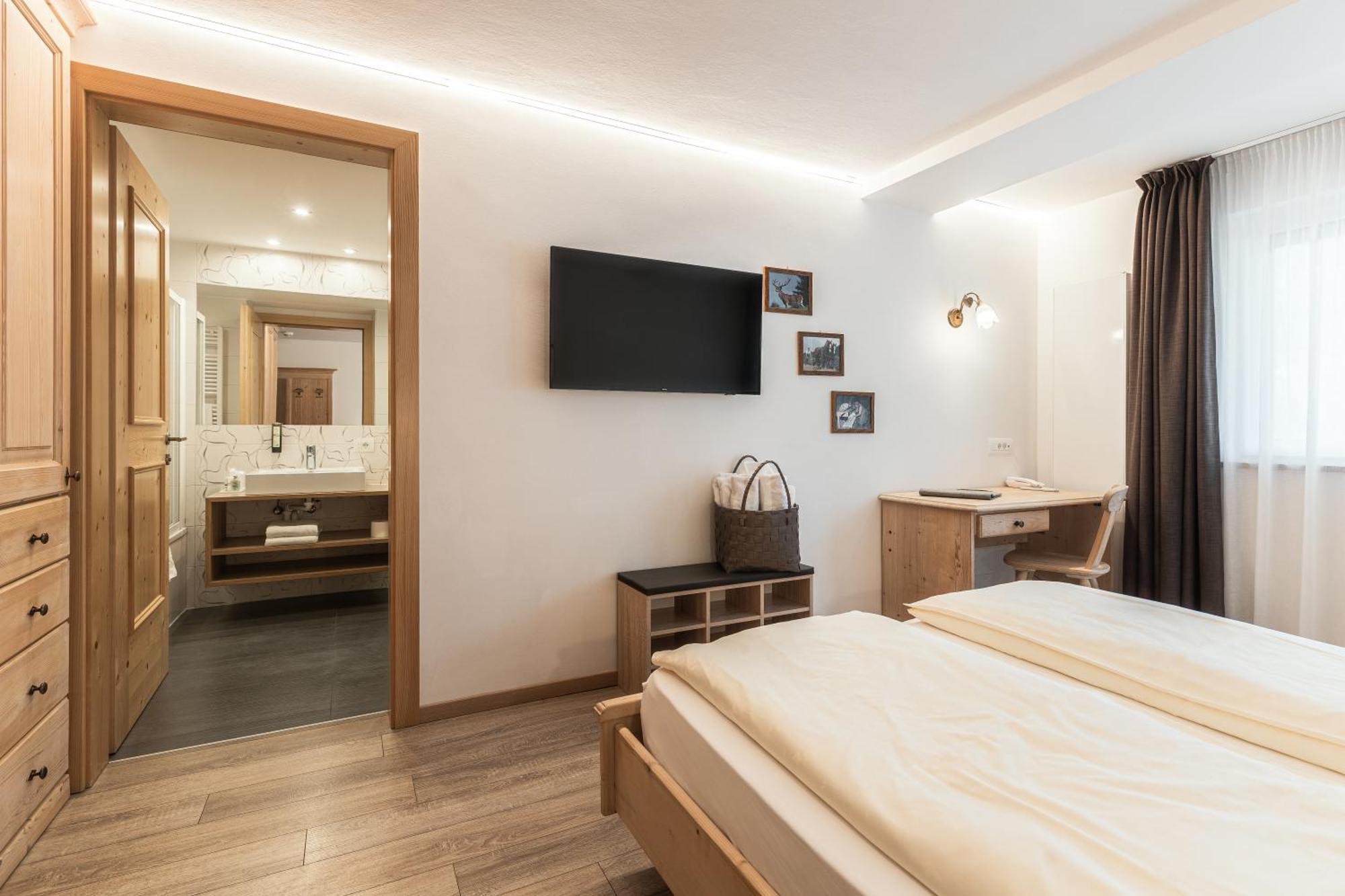 Hotel La Pineta Selva di Val Gardena Szoba fotó