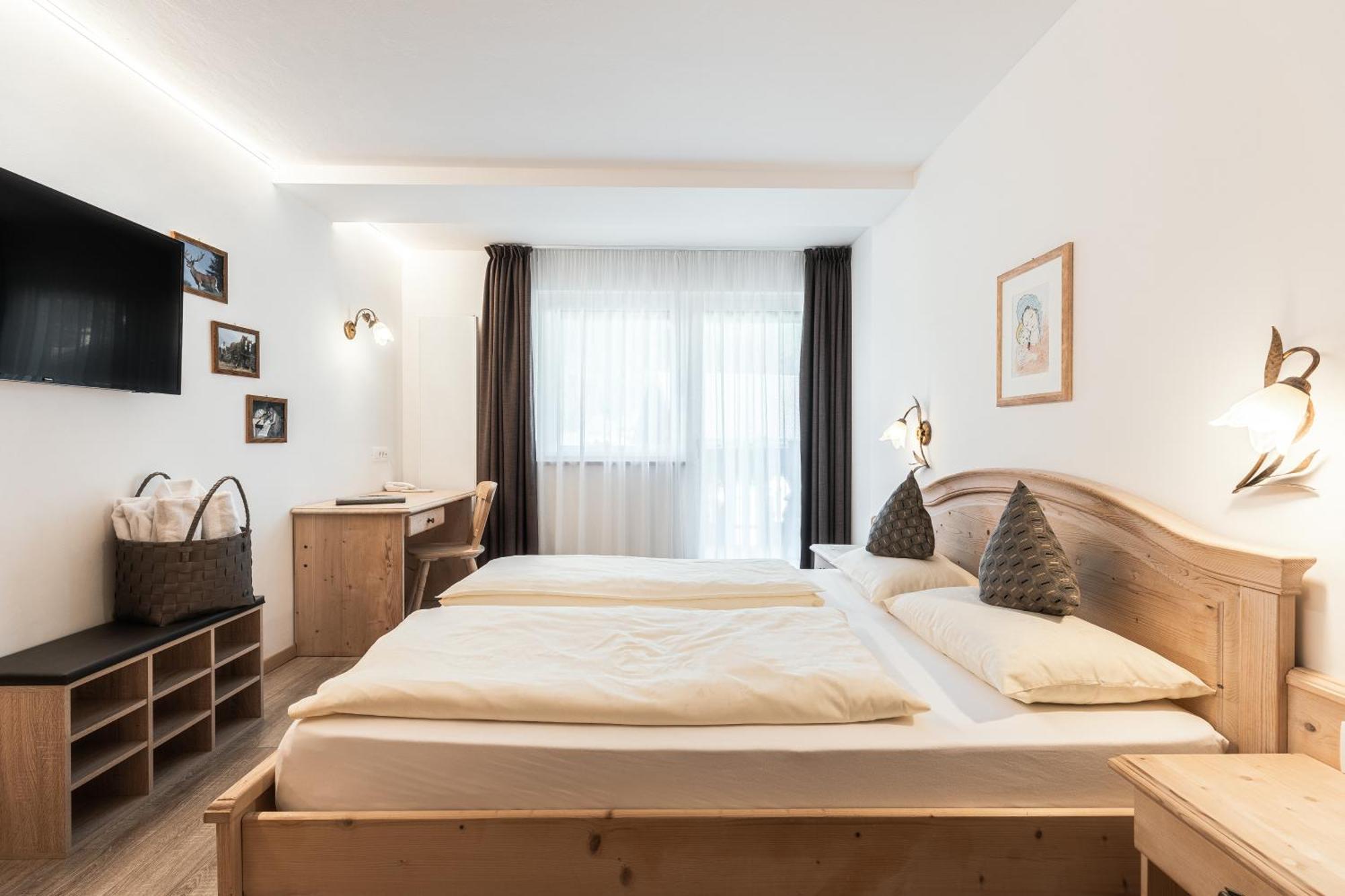 Hotel La Pineta Selva di Val Gardena Szoba fotó